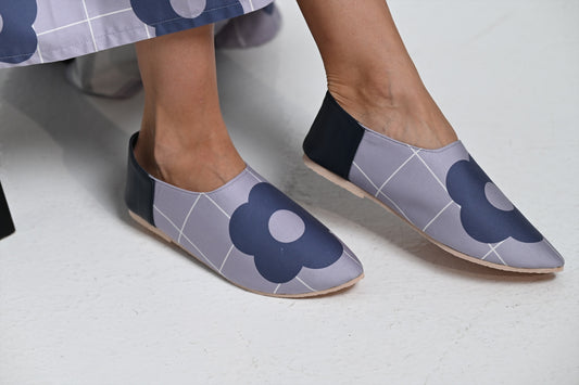 Blue shoes with a navy rose print
