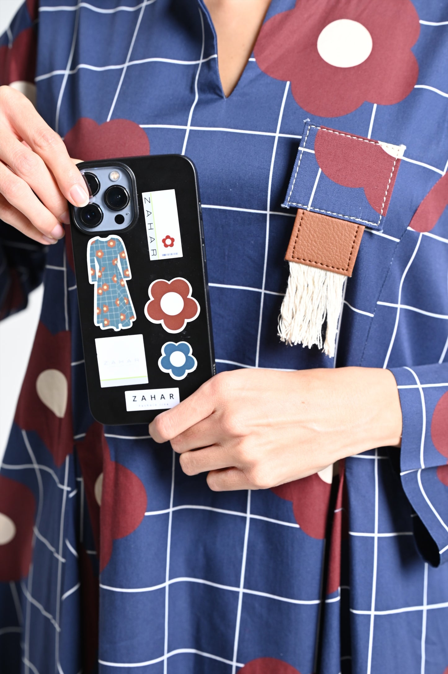 Navy dress with burgundy rose print & leather brooch