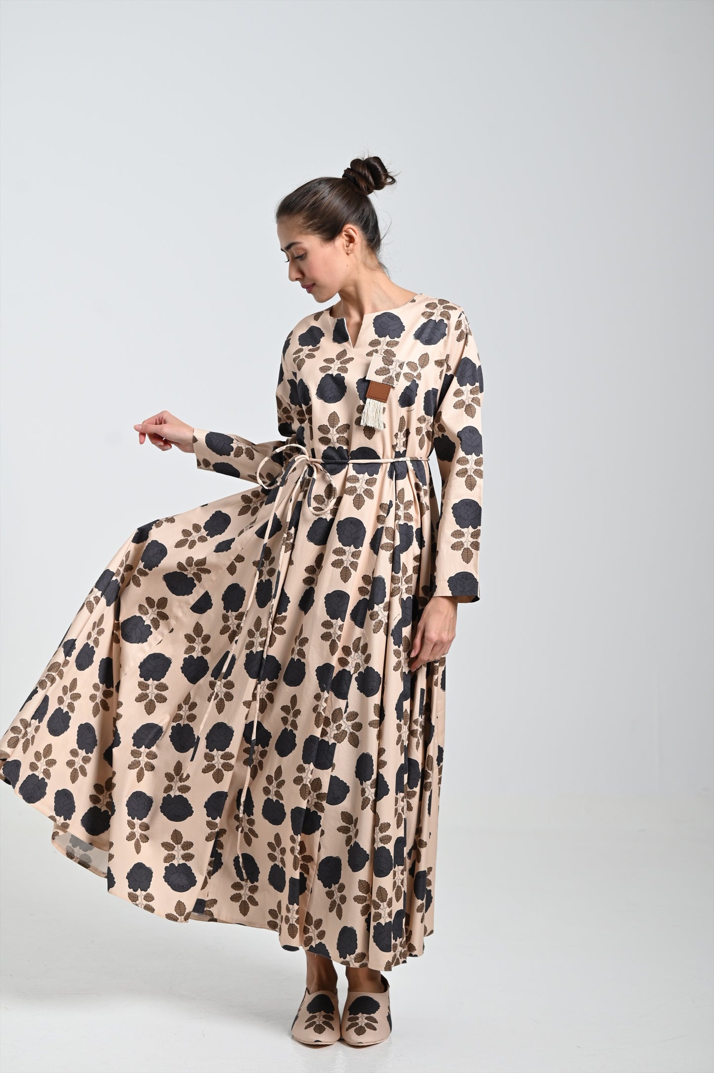 Beige dress & leather brooch