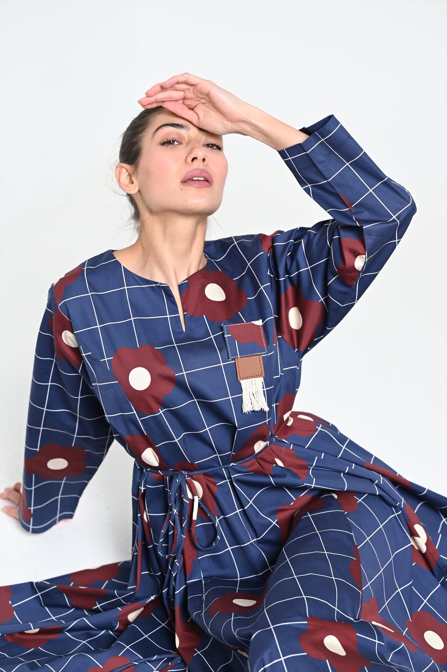 Navy dress with burgundy rose print & leather brooch