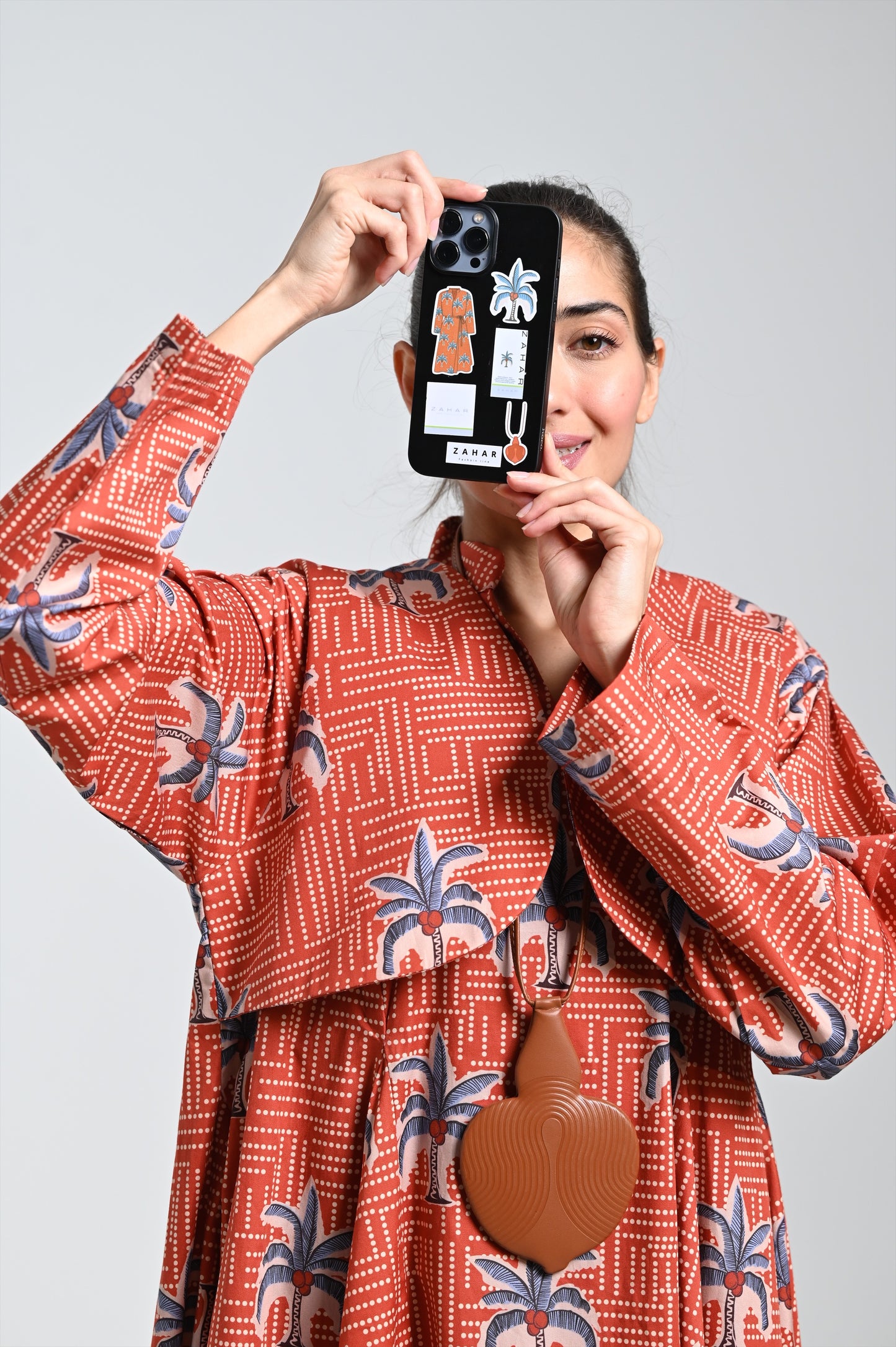 Bronze dress with palm tree print & leather necklace